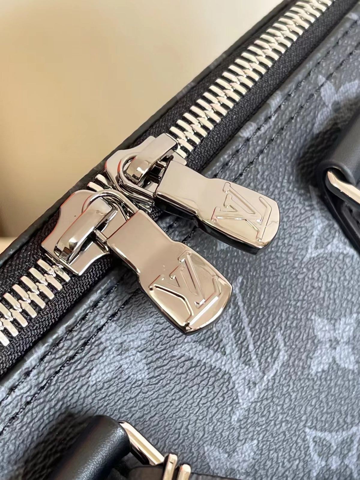 L classic embossed black hand-held cross-body bag 0725012104
