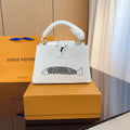 L Capucines cowhide handbag XC24101009