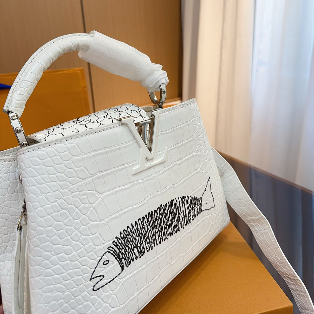 L Capucines cowhide handbag XC24101009