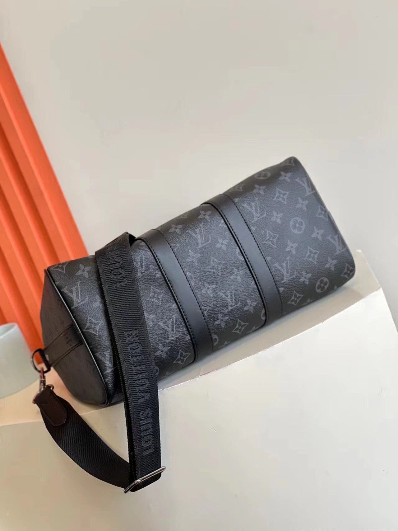 L classic embossed black hand-held cross-body bag 0725012104