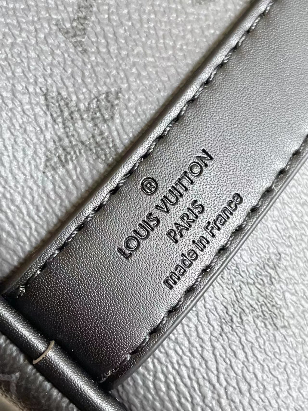 L classic embossed black hand-held cross-body bag 0725012104